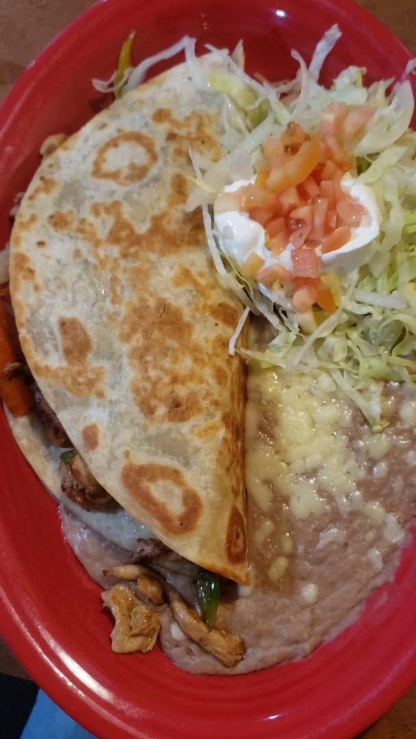 Mexican dishes served on white plates